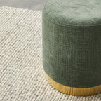 Pouf rond en tissu vert mousse