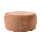 Grand pouf rond en tissu rose poudré