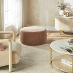 Grand pouf rond en tissu rose poudré