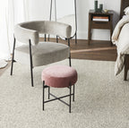 Repose-pieds rond en tissu rose vif